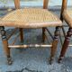 Two Louis Philippe cane chairs in solid carved wood from the 20th century