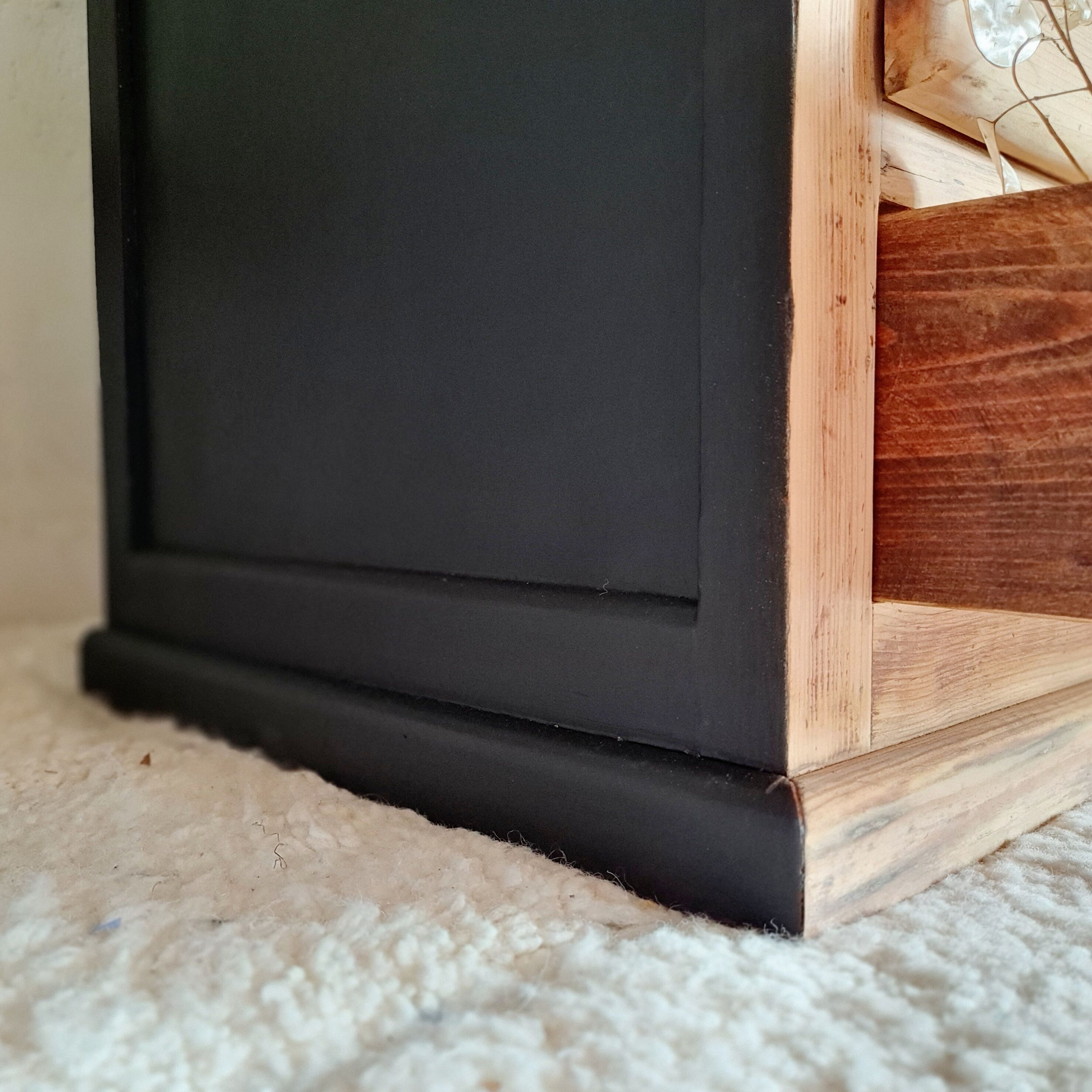 Old wooden chest of drawers raw and black wood