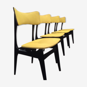 4 chaises années 1950 en bois lacqués noir et vinyle jaunes