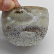 Trilogy of cups or Japanese-style goblets by the Danish ceramist Gutte Eriksen using RAKU technique.