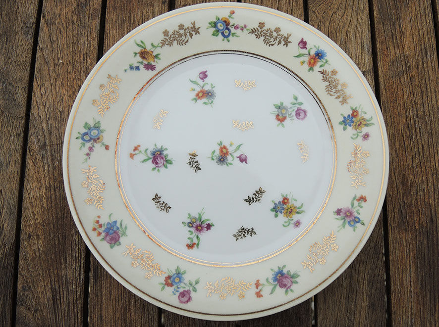 11 Limoges porcelain dessert plates, Raynaud & Co