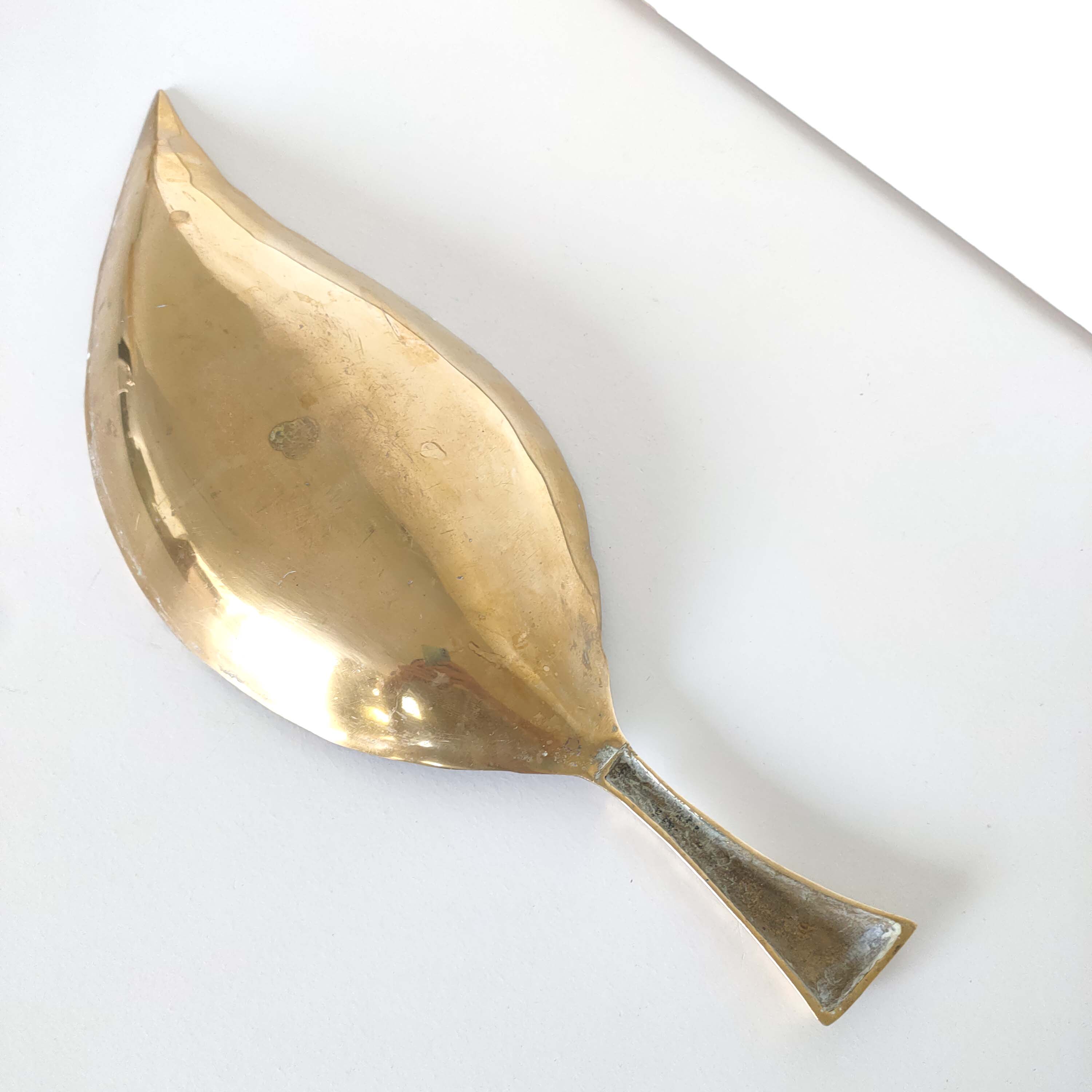Empty brass leaf pocket
