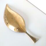 Empty brass leaf pocket