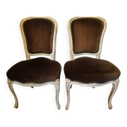 A pair of Louis XV style armchairs in wood and velvet fabrics