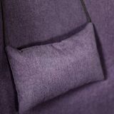 High-backed wing chair in oak and purple fabric, vintage Scandinavian style from the 1950s.