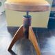 Adjustable vintage piano stool made of wood and velvet