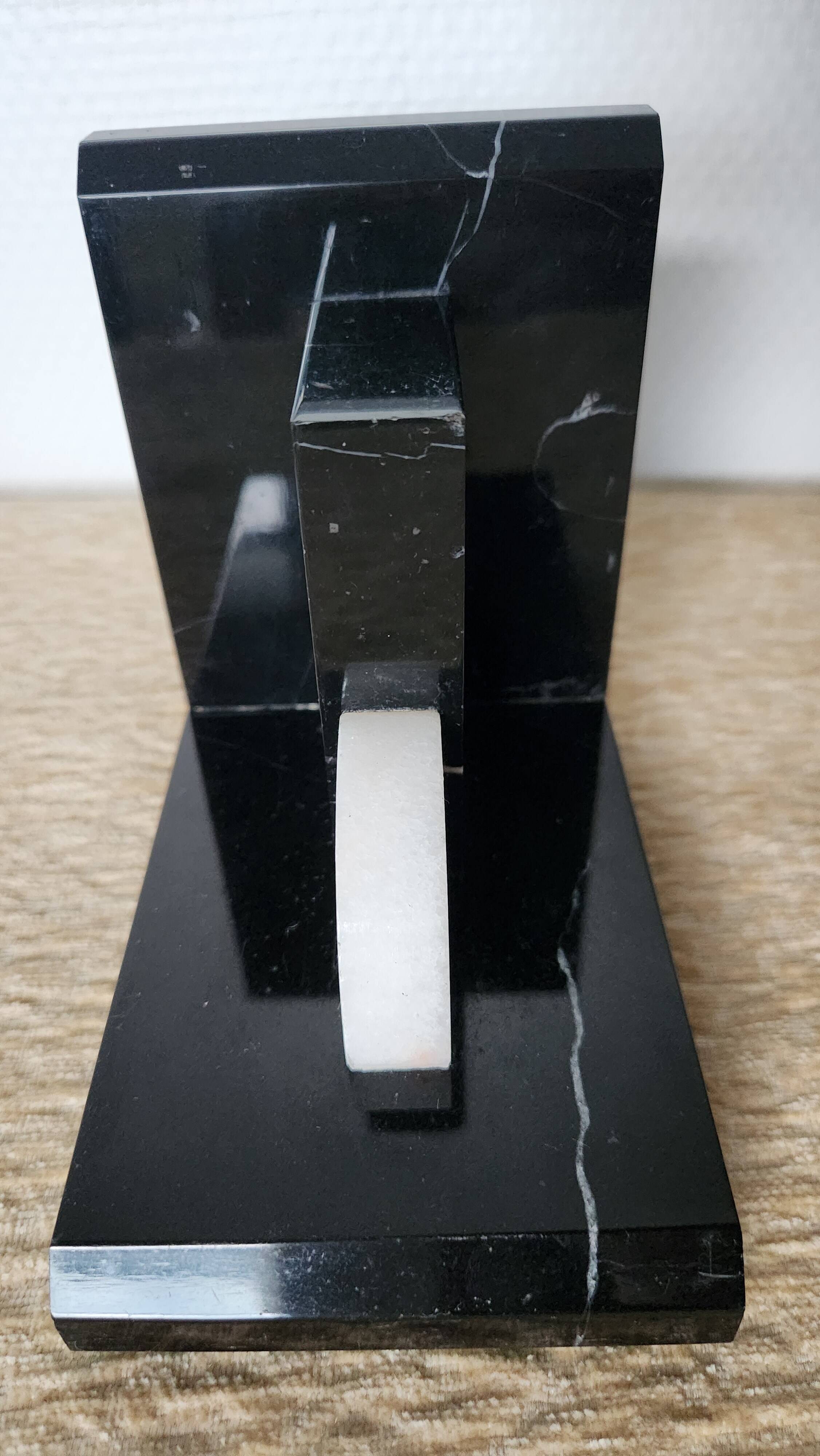 Geometric bookends in black marble and white stone – Art Deco style