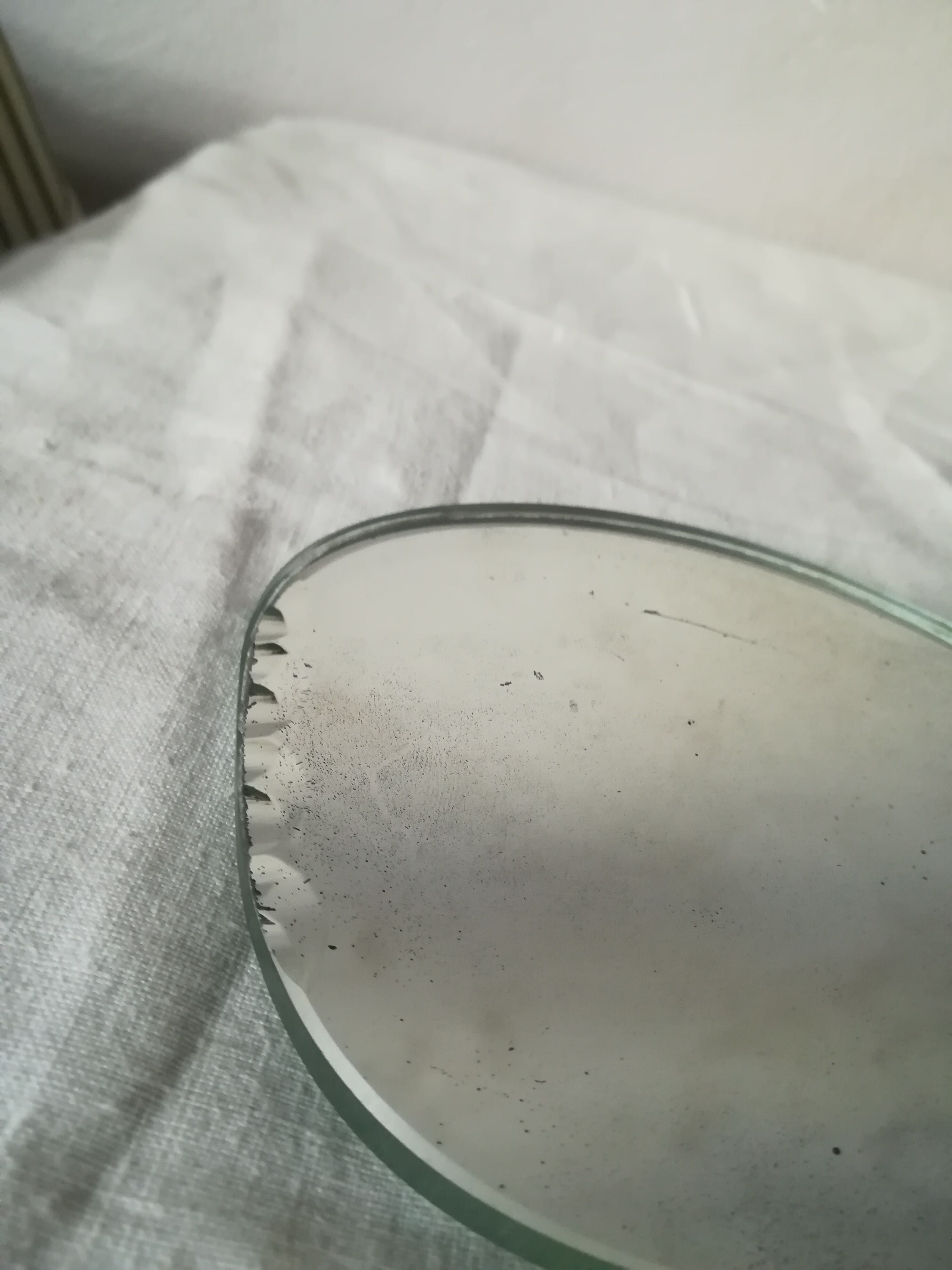 Mirror facing old hand