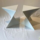 Pair of unmarked triangular white design stools