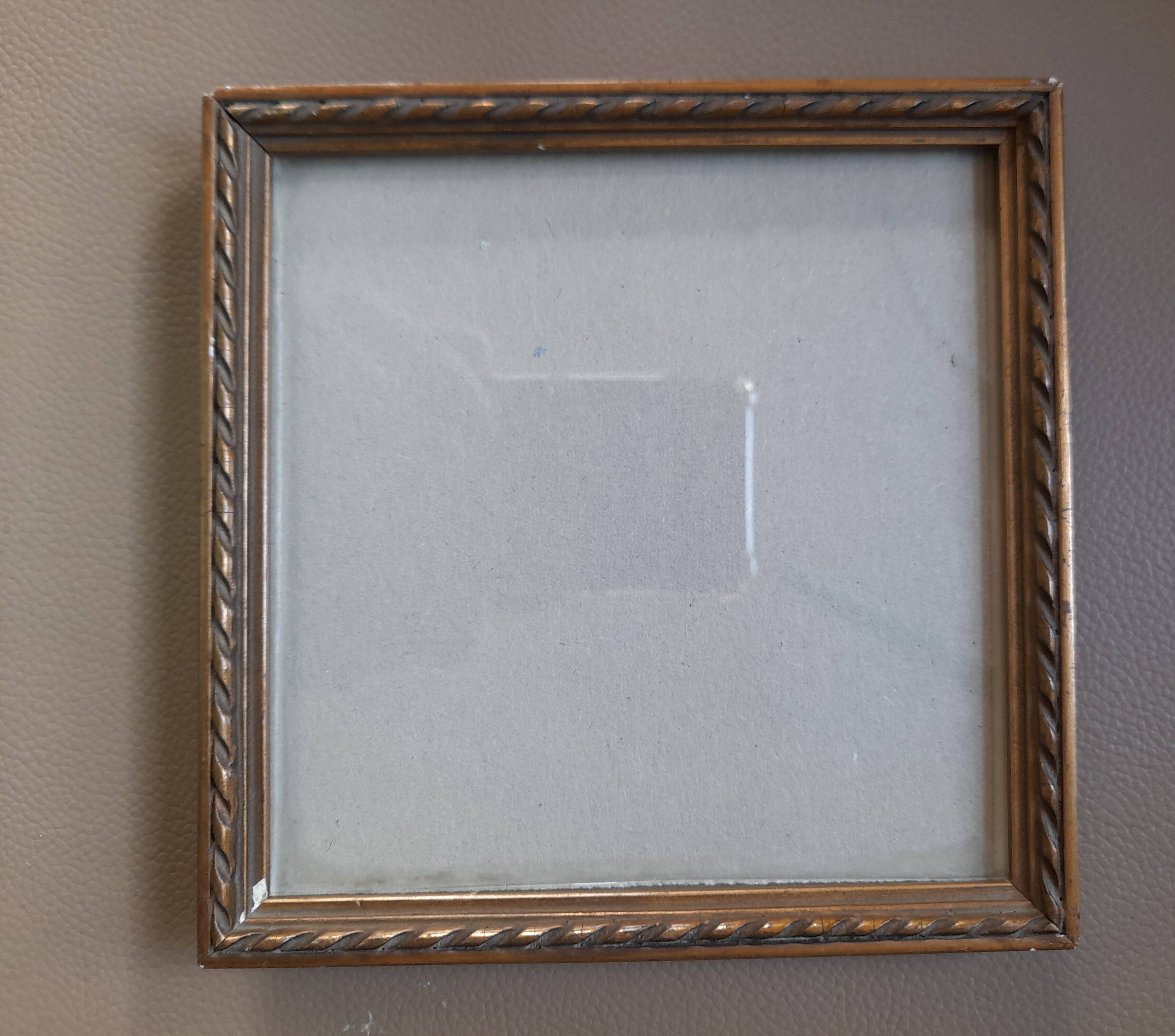 Old square golden frame to place or hang