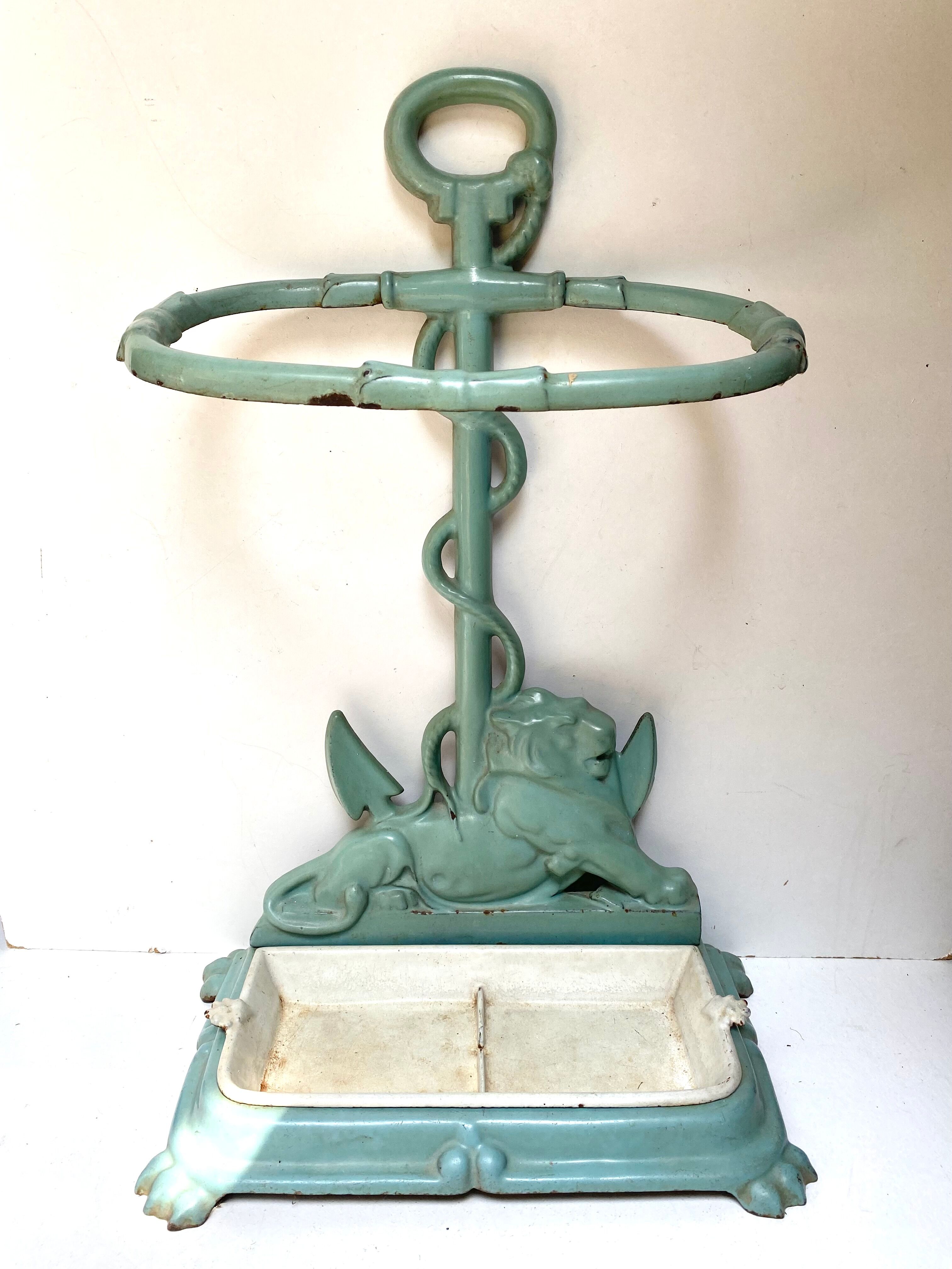 Enameled cast iron umbrella stand from the early 20th century