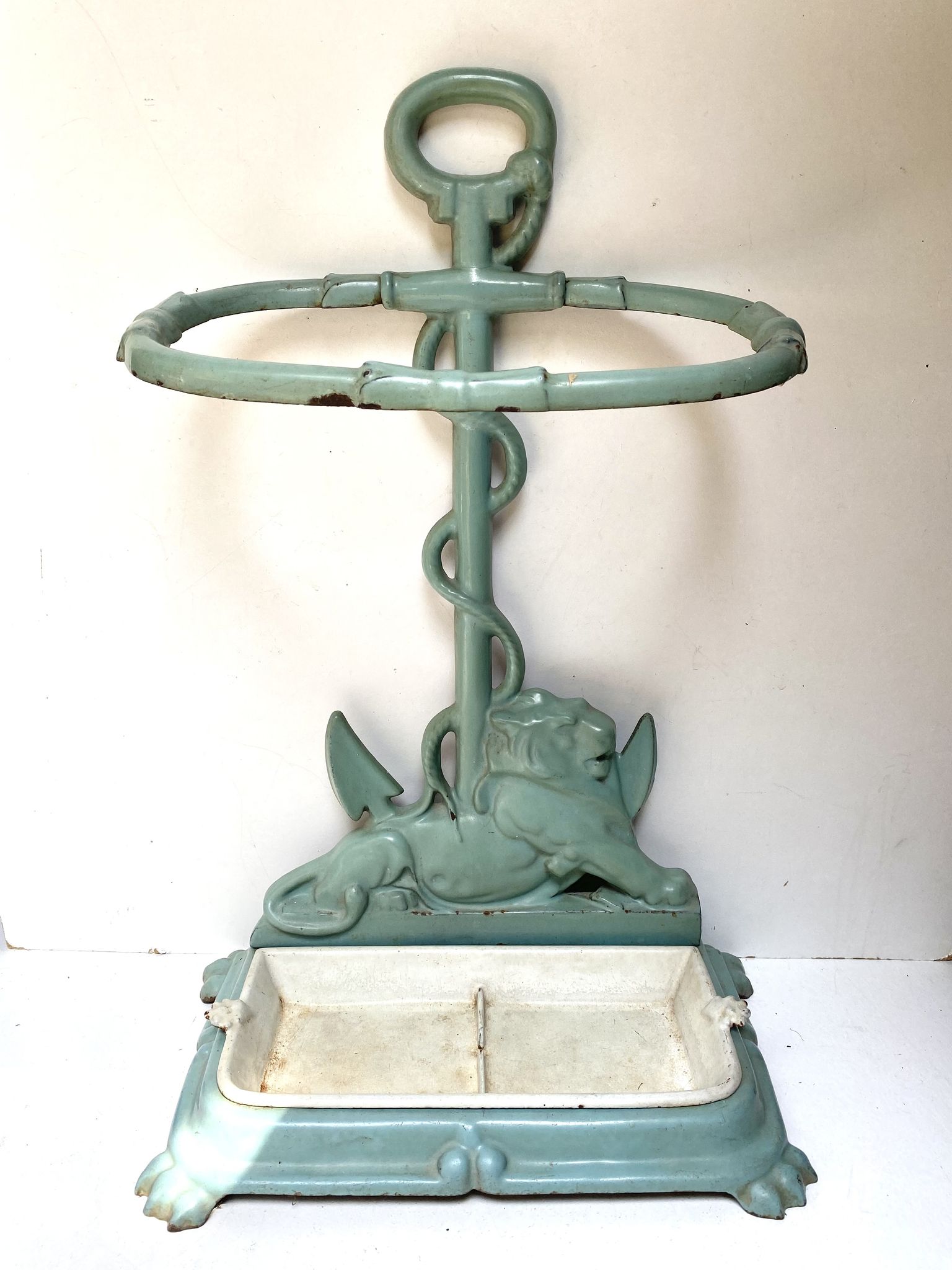 Enameled cast iron umbrella stand from the early 20th century