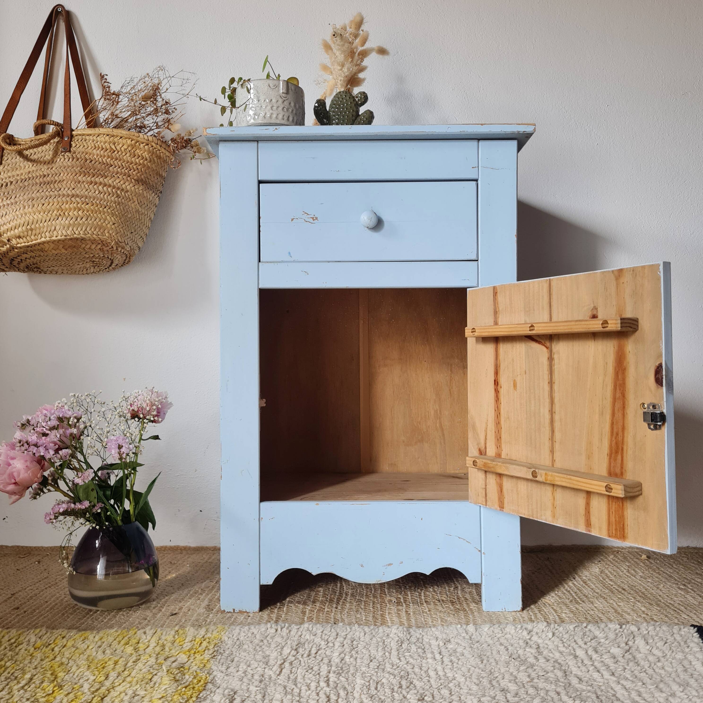 Handcrafted blue chest of drawers.