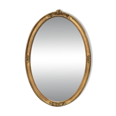 Oval mirror in carved wood