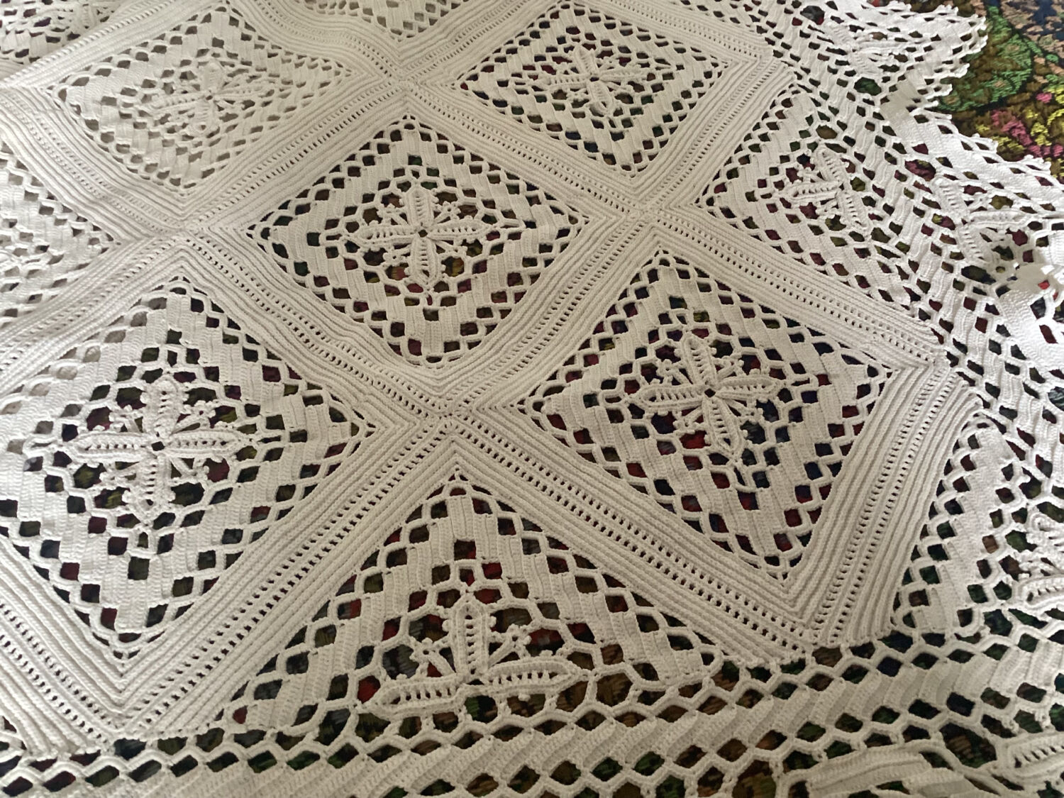 White cotton crochet bedspread with diamonds