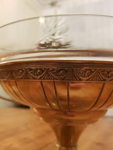 Art Deco brass cup and its engraved saucer.