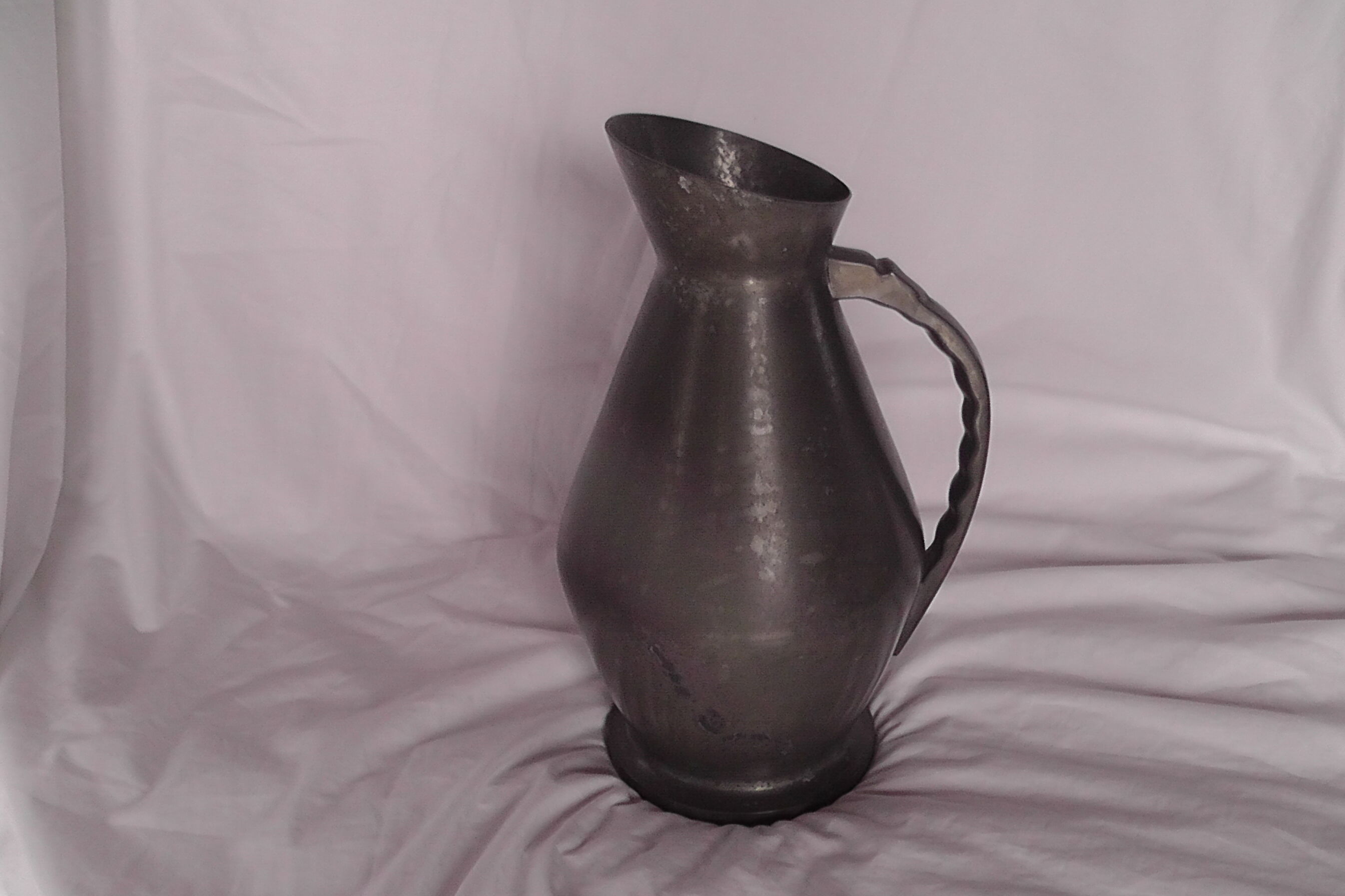 Tin pitcher vase of the manor