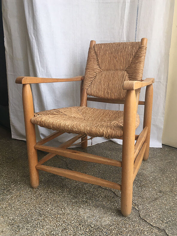 "Paillé" armchair by Charlotte Perriand