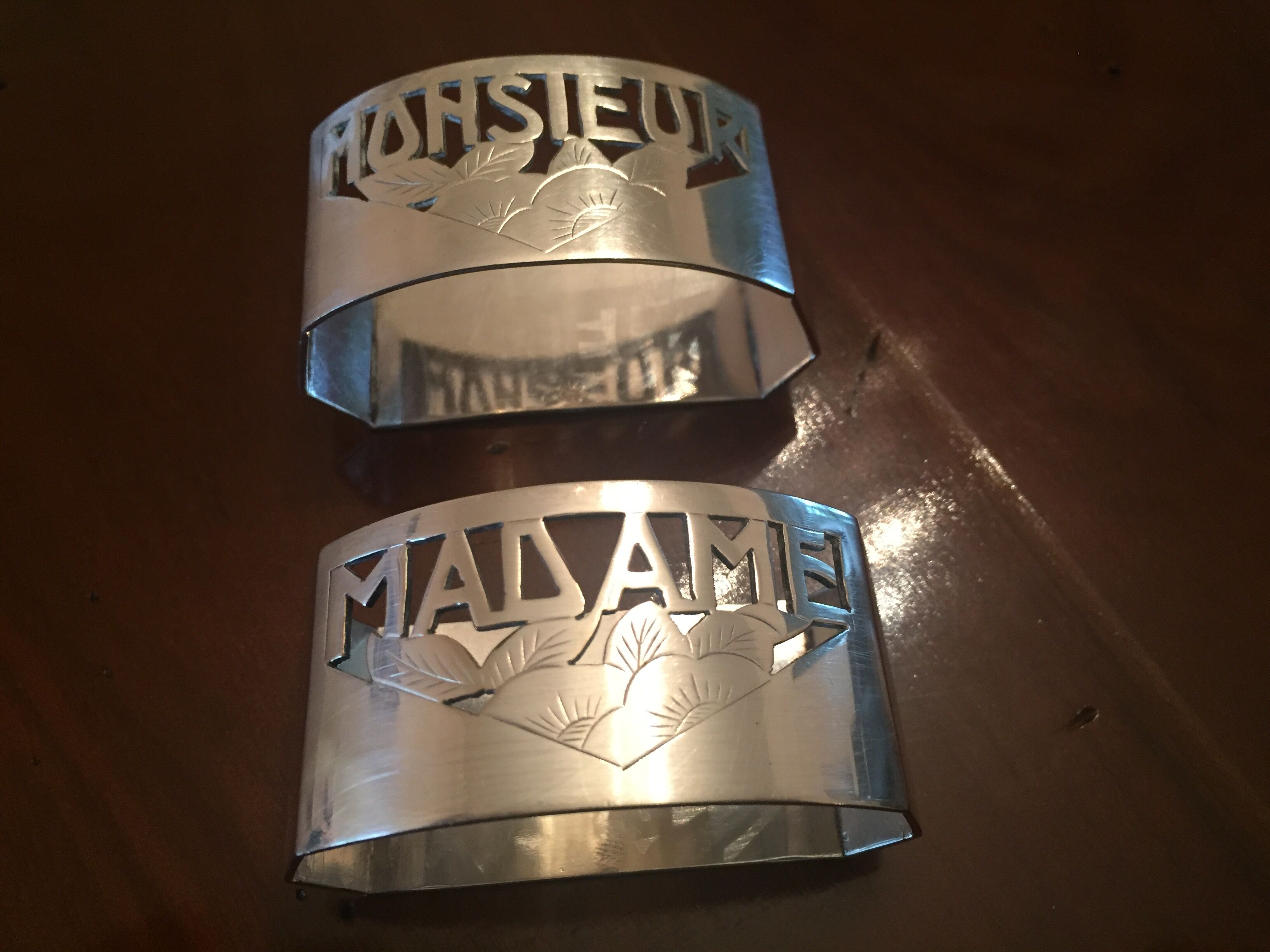 2 Old silver towel rounds