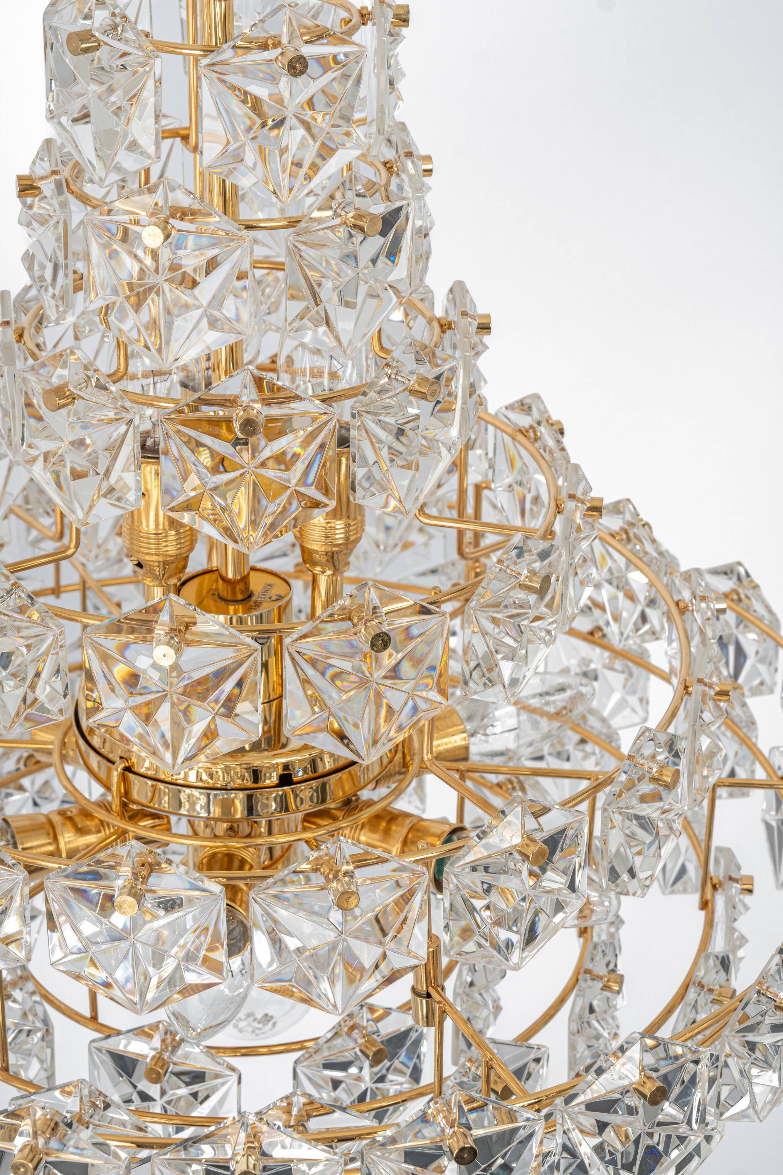 Chandelier, brass and crystal glass by Kinkeldey, Germany, 1970s.