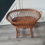 Old vintage rattan crib on wheels, missing a handle 60 by 40cm high 52cm for doll