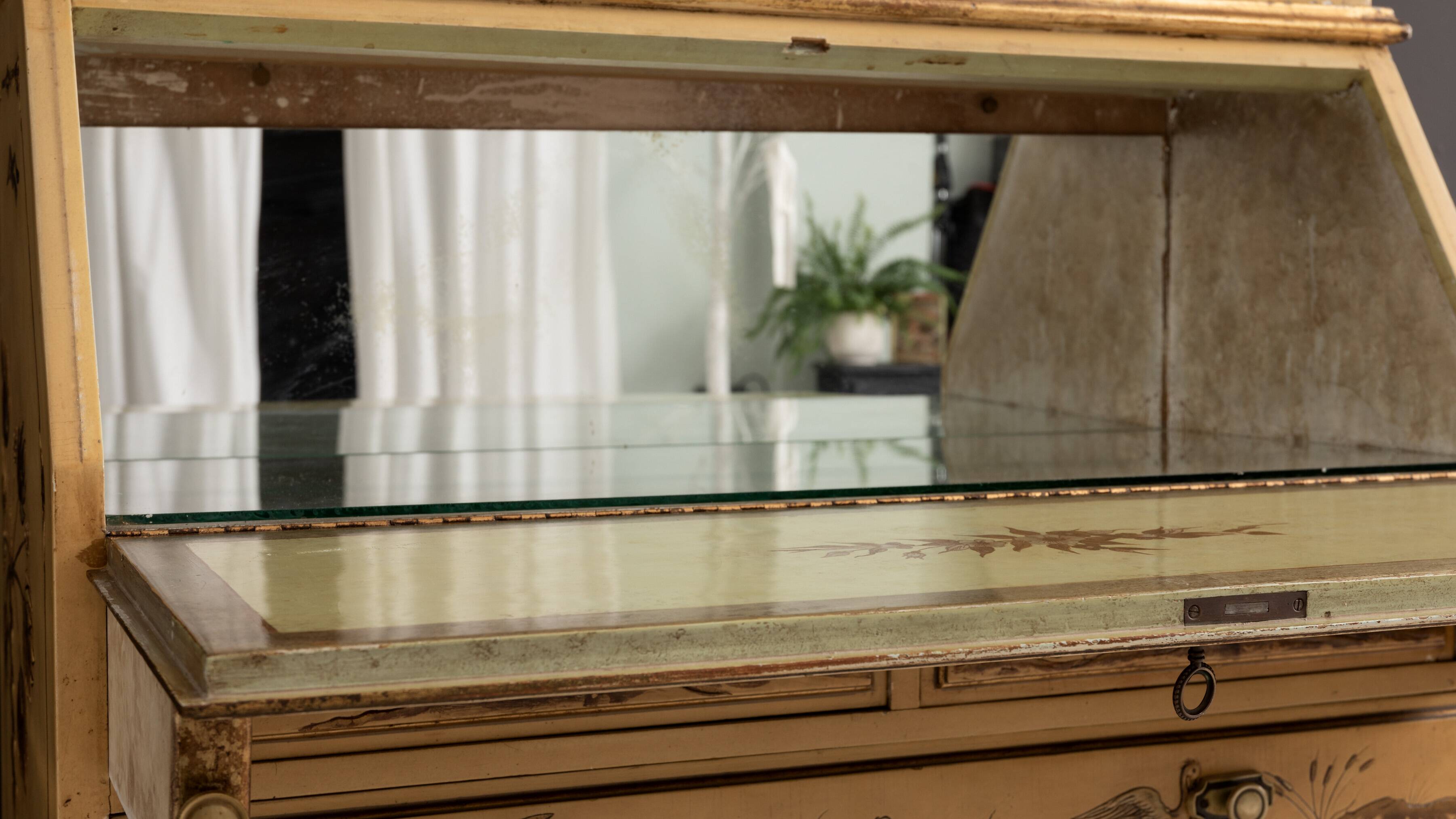 Desk with oriental motifs in relief