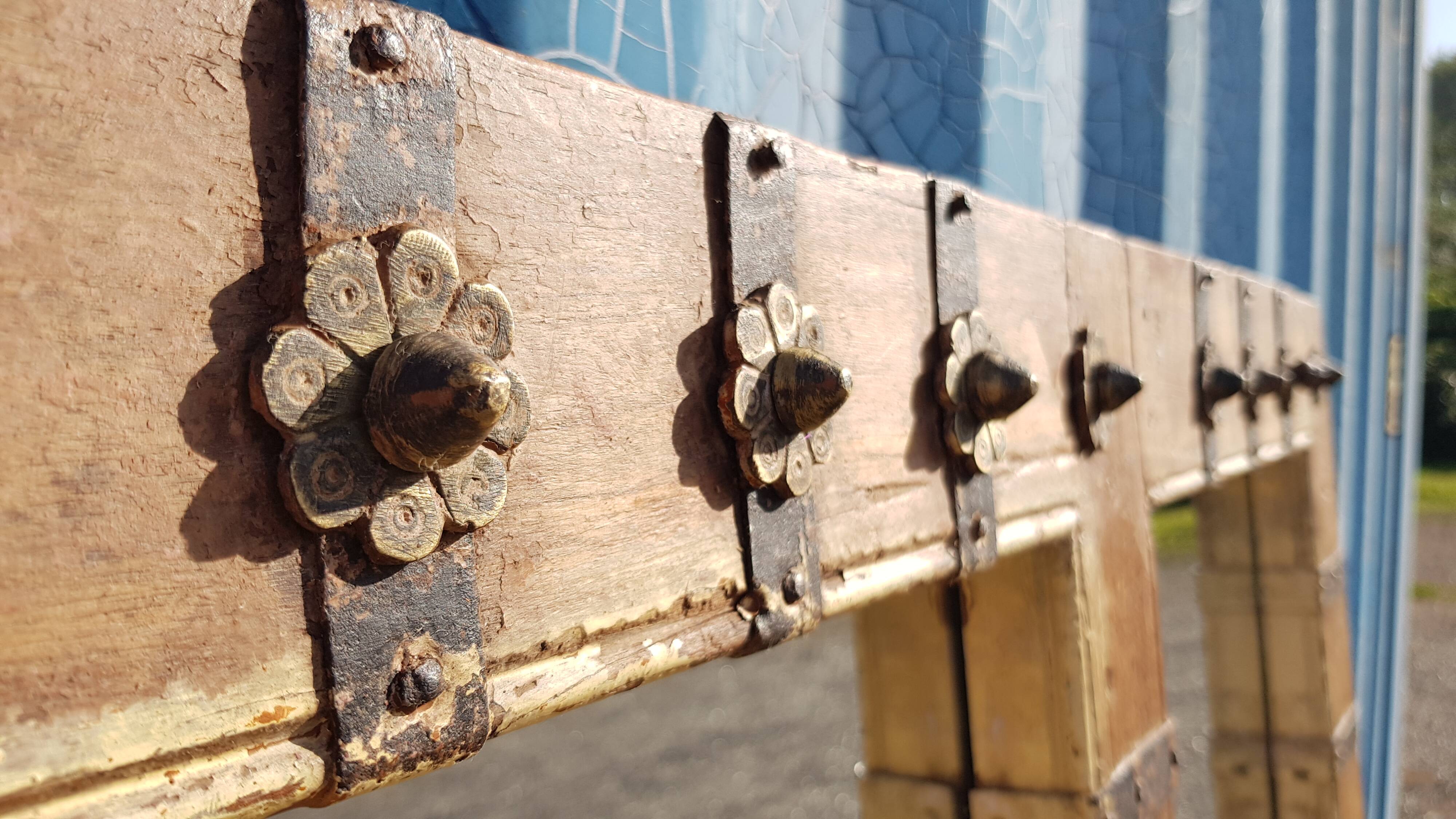 Old Burmese teak mirror with copper fittings