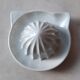 White earthenware citrus press