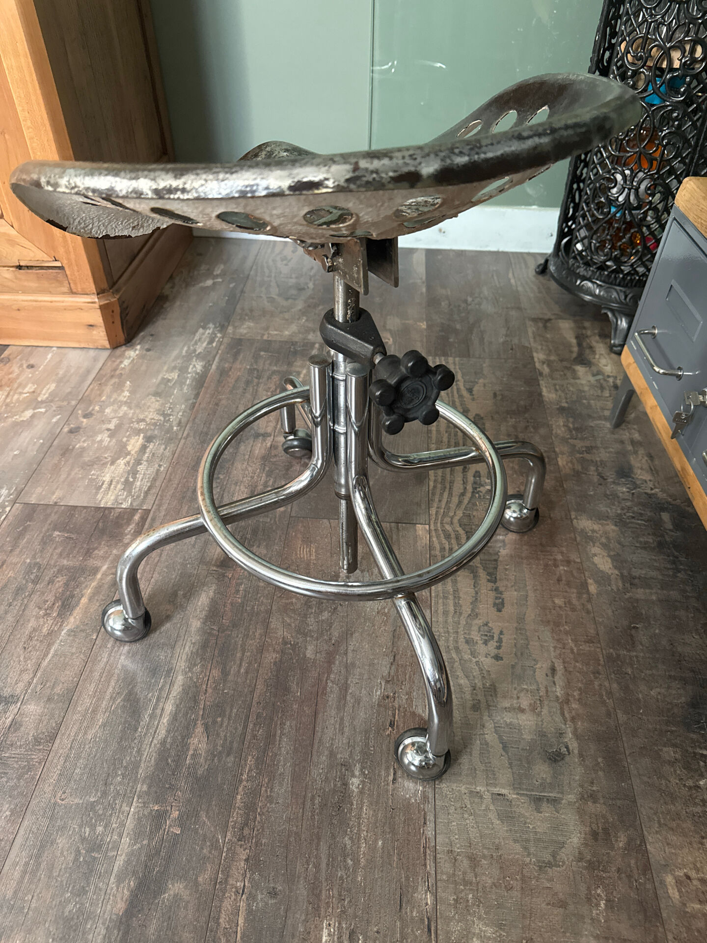 industrial chair with a perforated metal seat