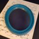 Small turquoise oval mirror
