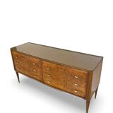 Veneered burl walnut chest of drawers with light warm brown glass top