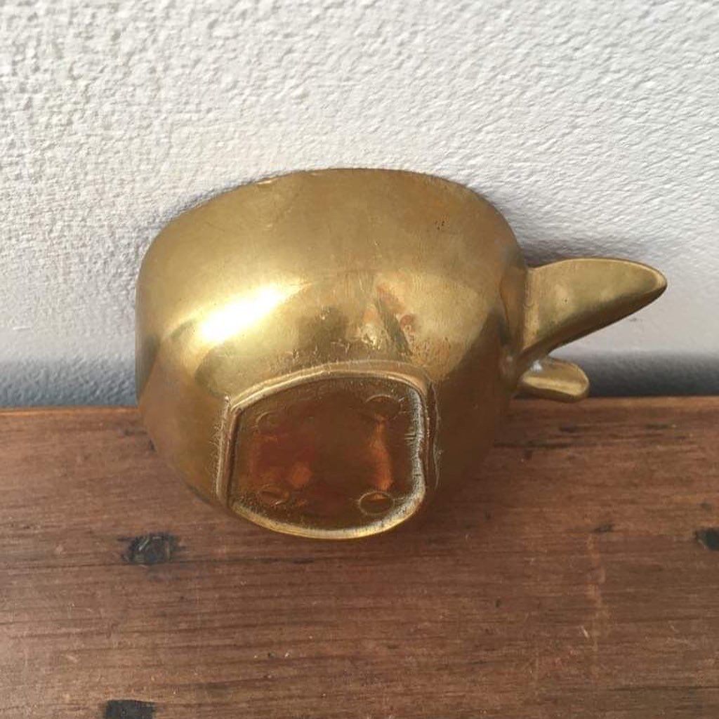 Empty brass pocket apple.