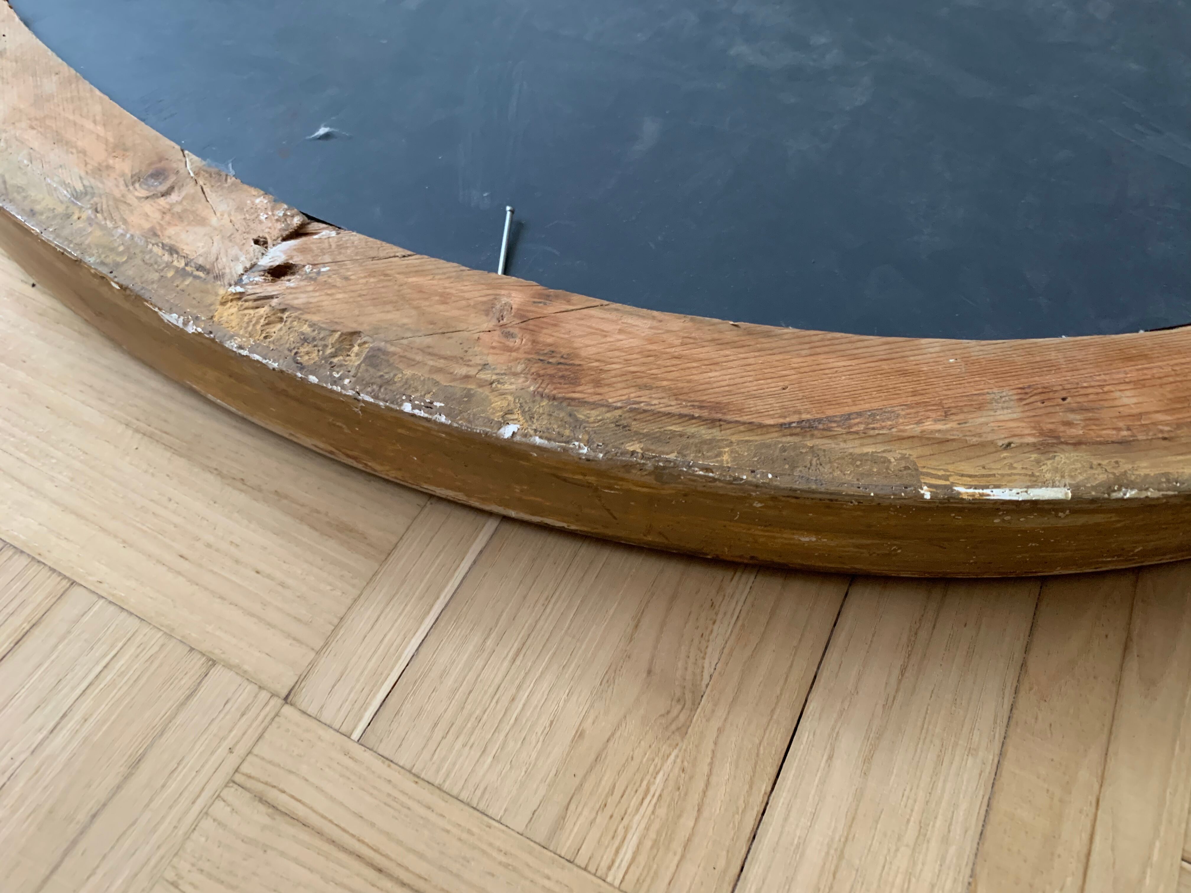 Old oval golden mirror