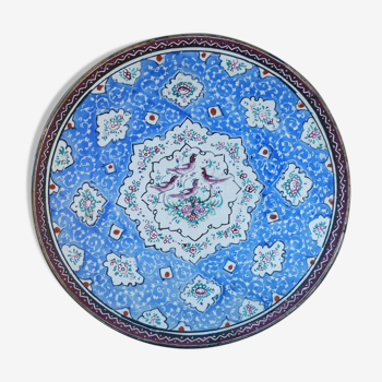 Decorative plate in blue enameled metal with bird motifs
