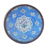 Decorative plate in blue enameled metal with bird motifs