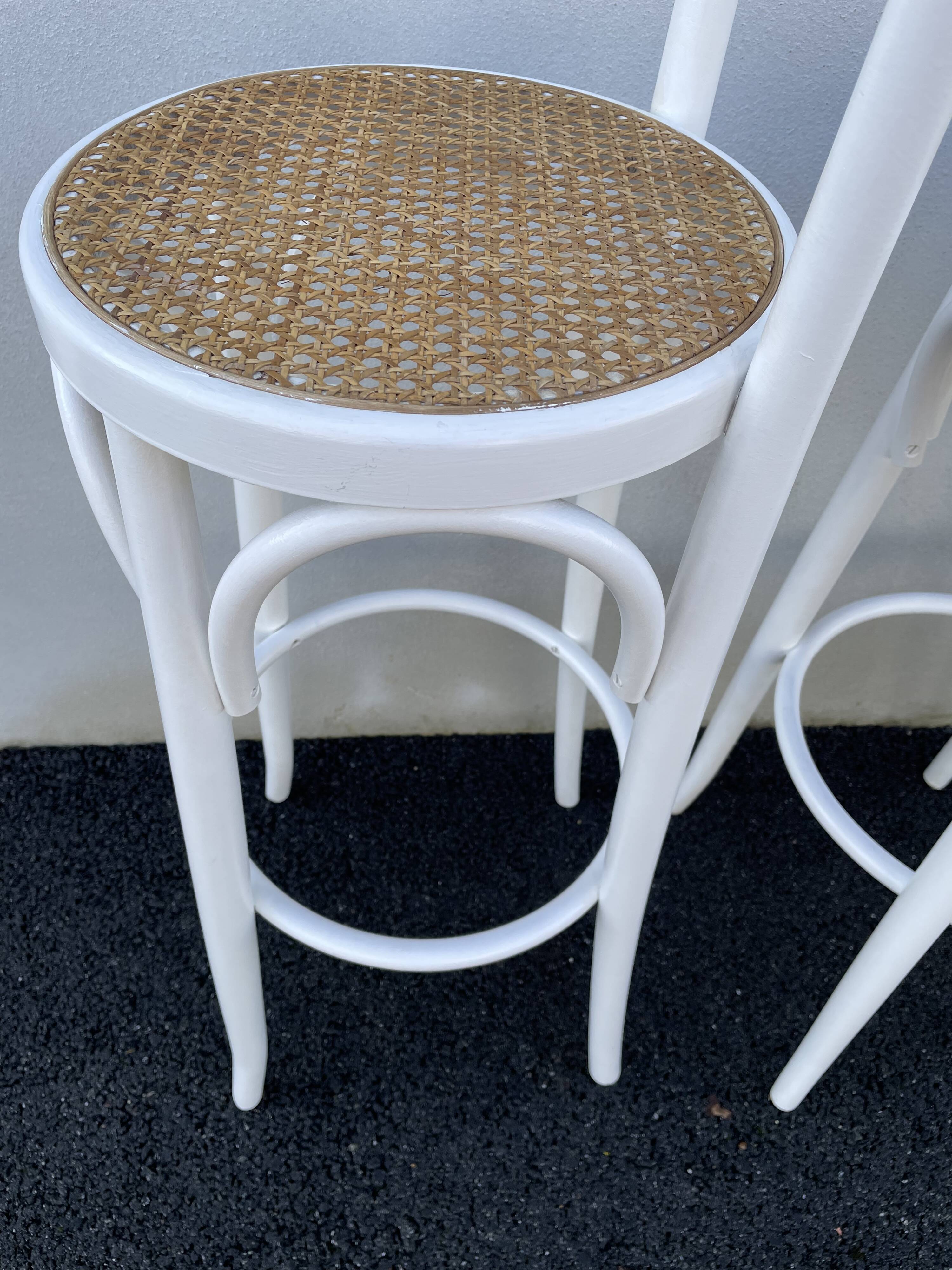High stools in cane and curved wood 1970-1980