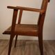 Vintage wooden armchair and canning 1950