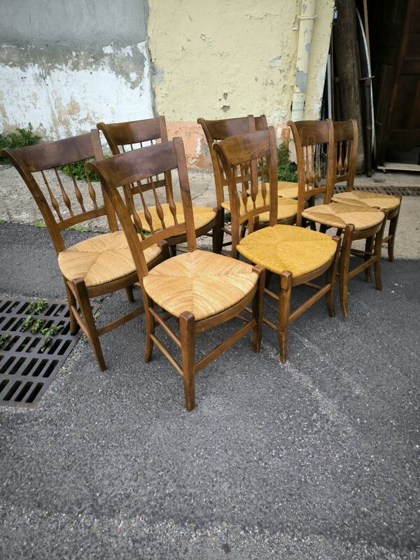 Série de 8 chaises en merisier massif paillées époque Directoire