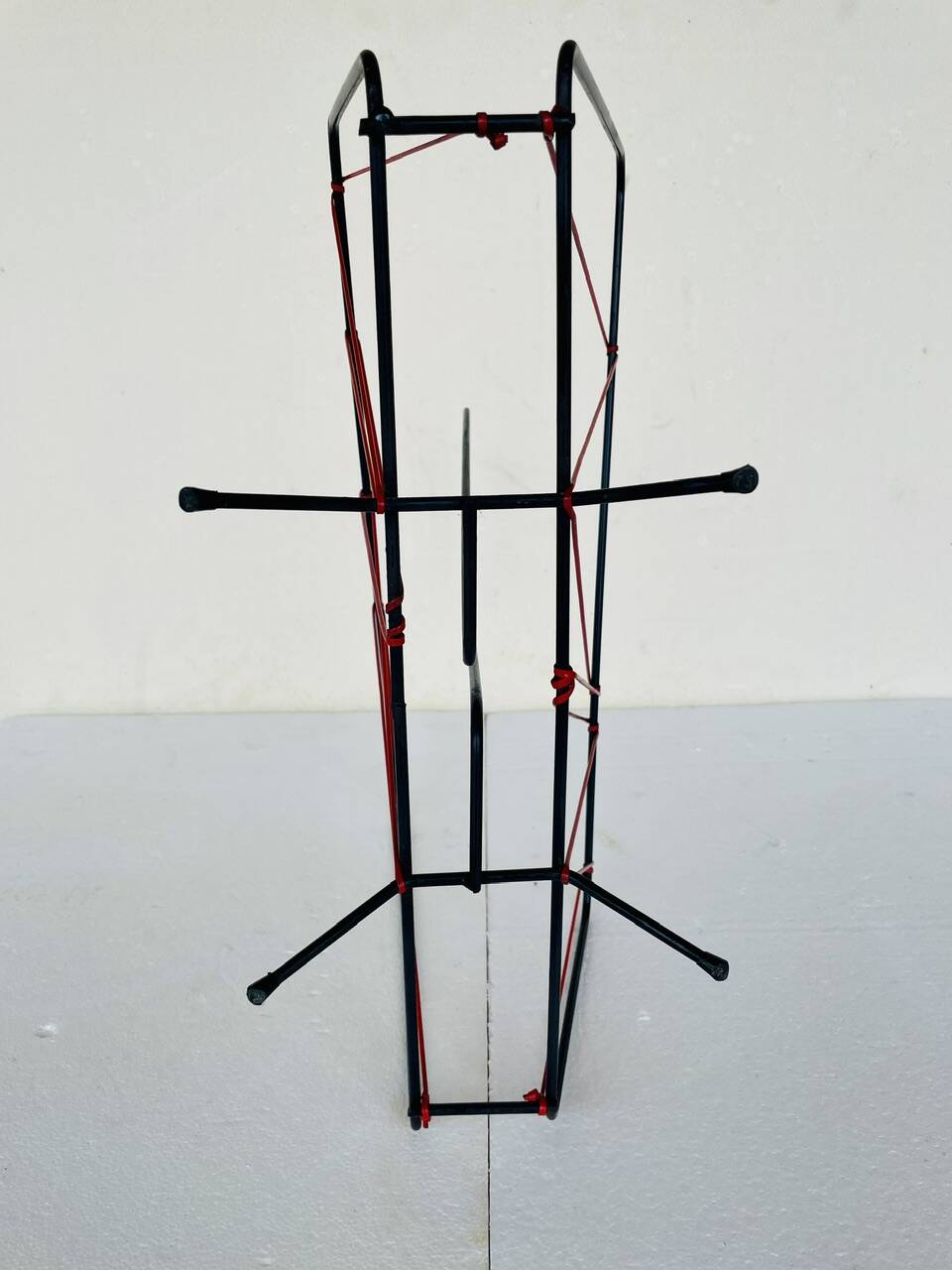 Vintage black metal magazine rack circa 19