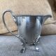 Jug or teapot with its HL Linton milk jug