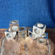Set of 6 minimalist chrome steel candle holders from the 70s.