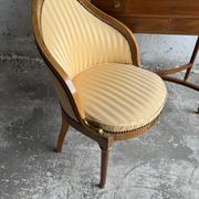 DeCoene antique wood writing desk with beige striped upholstered chair, brass-accented classic set