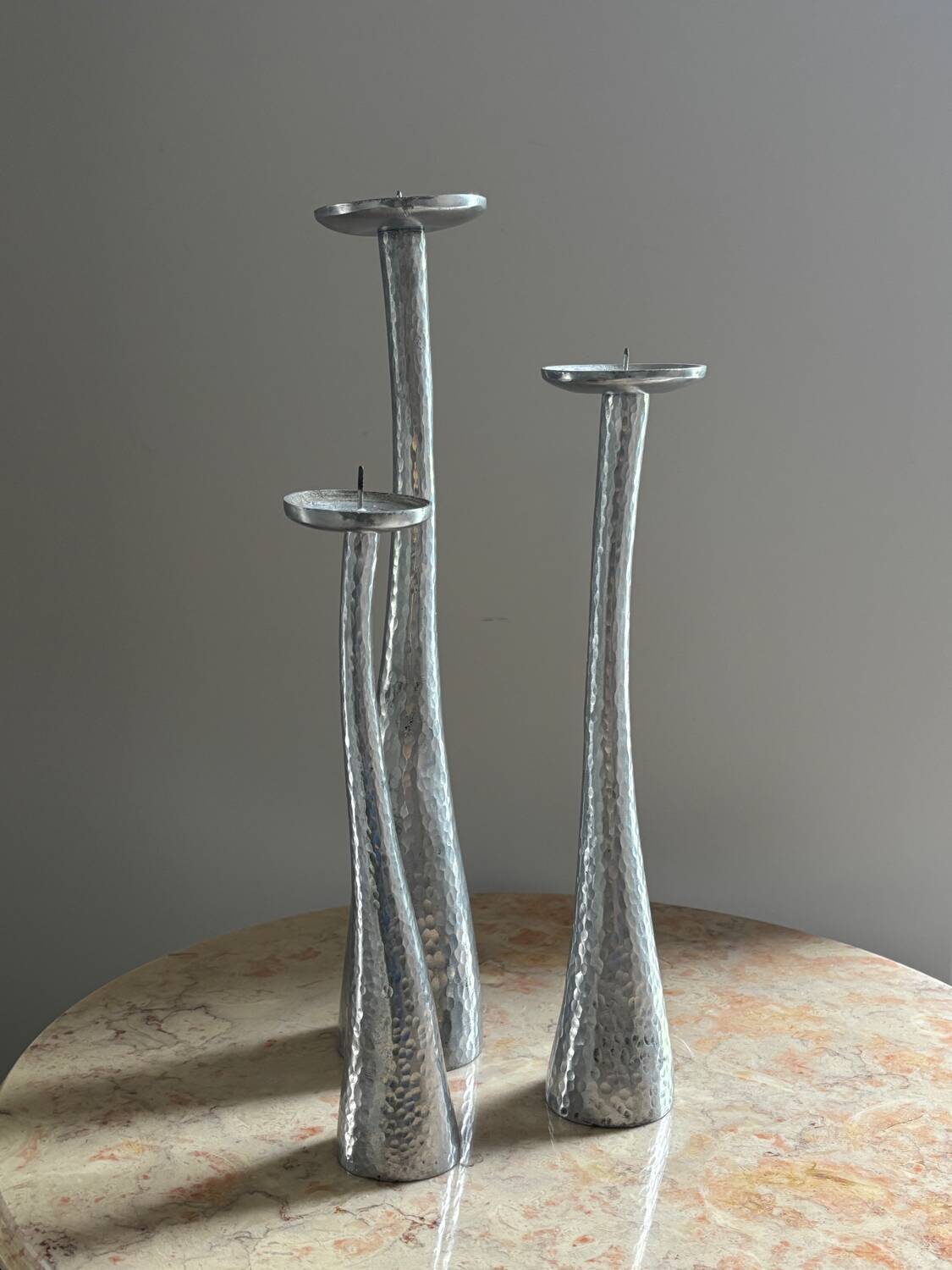 Cast aluminum candle holders