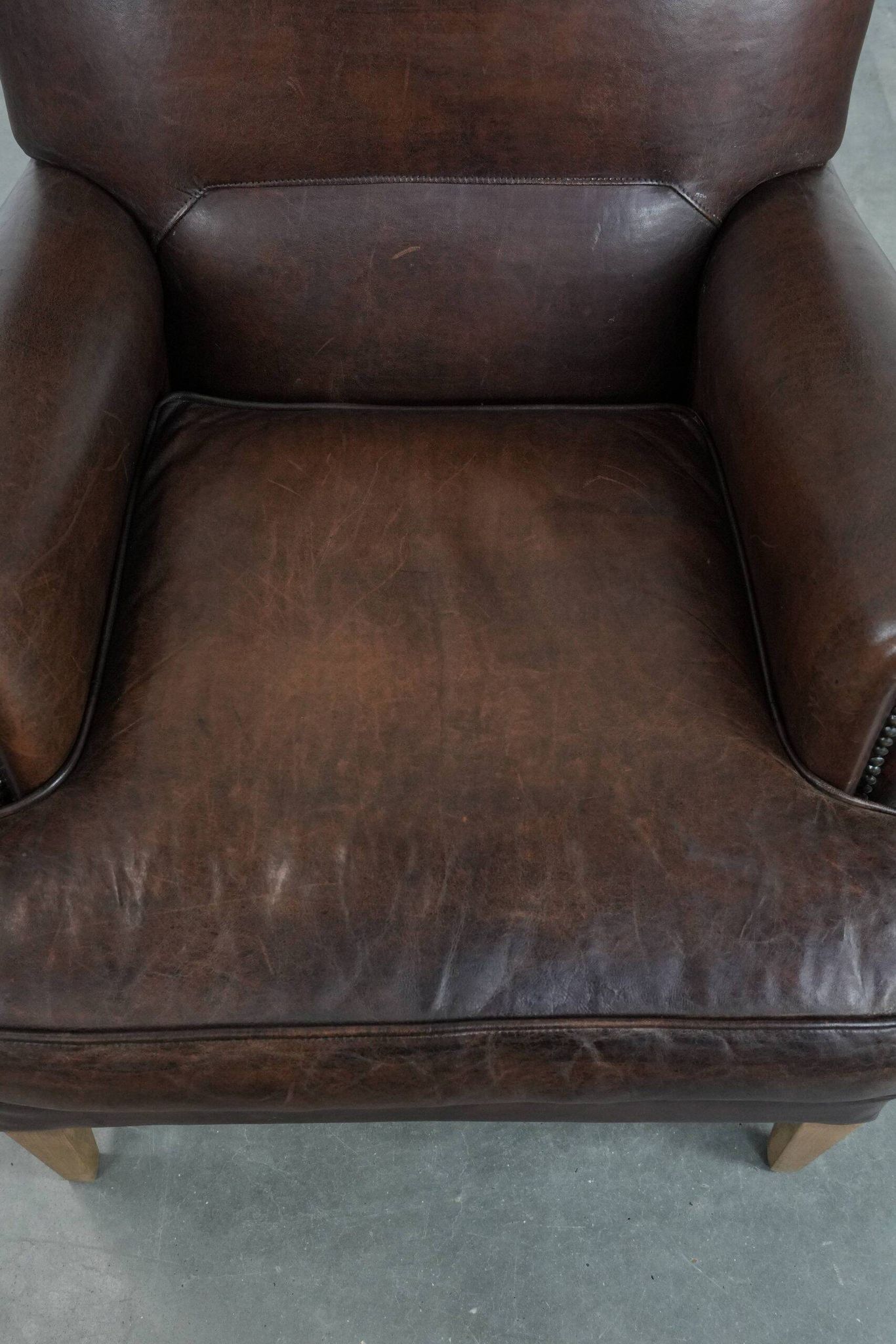 Beautiful Characterful Sheep Leather Armchair with a Deep Colour