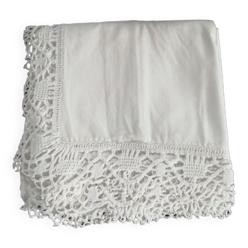 Old linen tablecloth with crocheted frills.