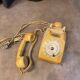 Old dial telephone from the 80s temat quimper bakelite yellow and beige