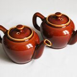2 brown glazed ceramic teapots