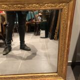 Old 19th century mirror in wood and gilded stucco