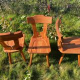 Three solid wood chairs