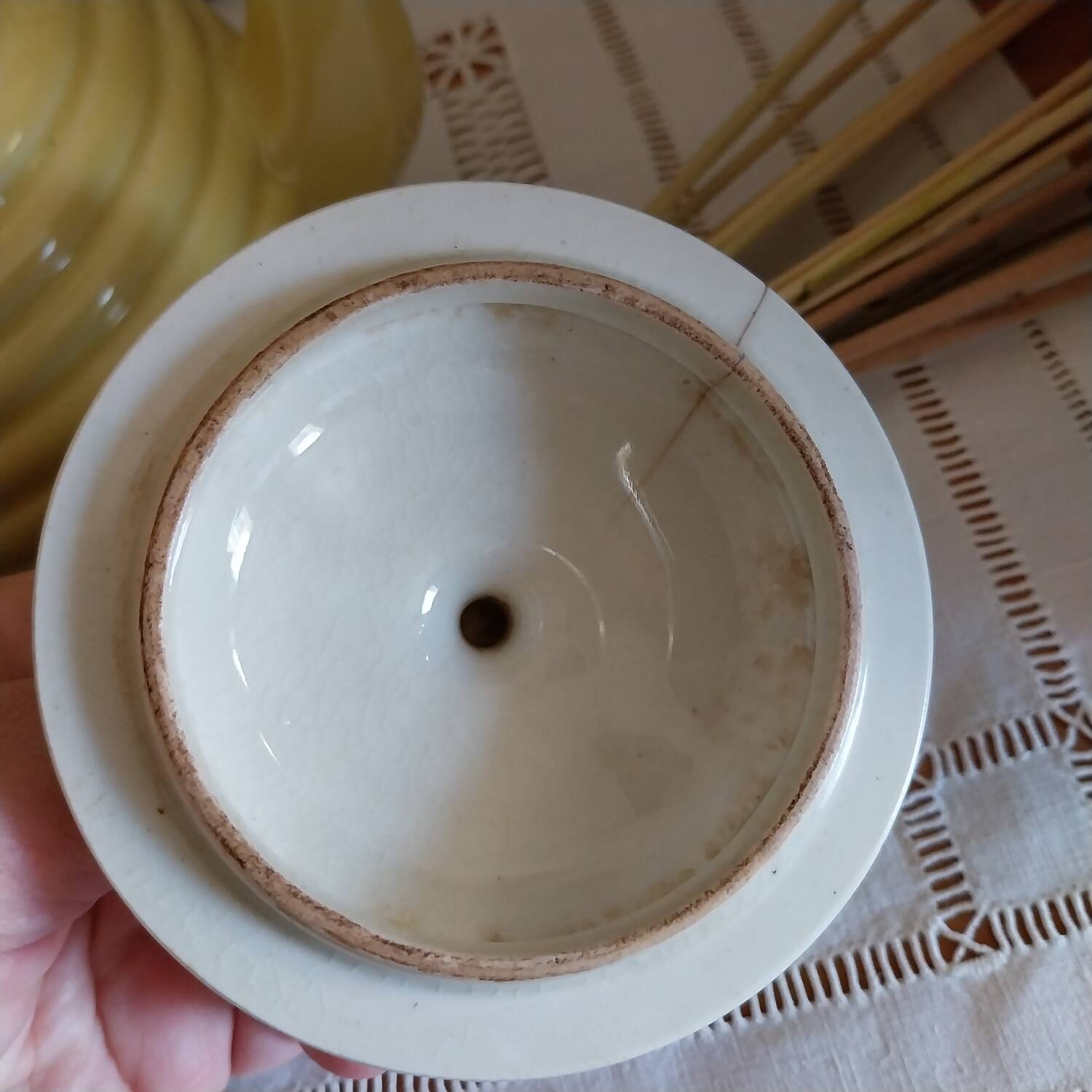 Old yellow earthenware teapot